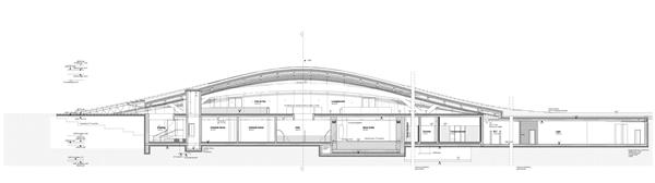 建筑师Hadi Teherani在高山风景环绕的拱形地形下创建了一个水疗中心